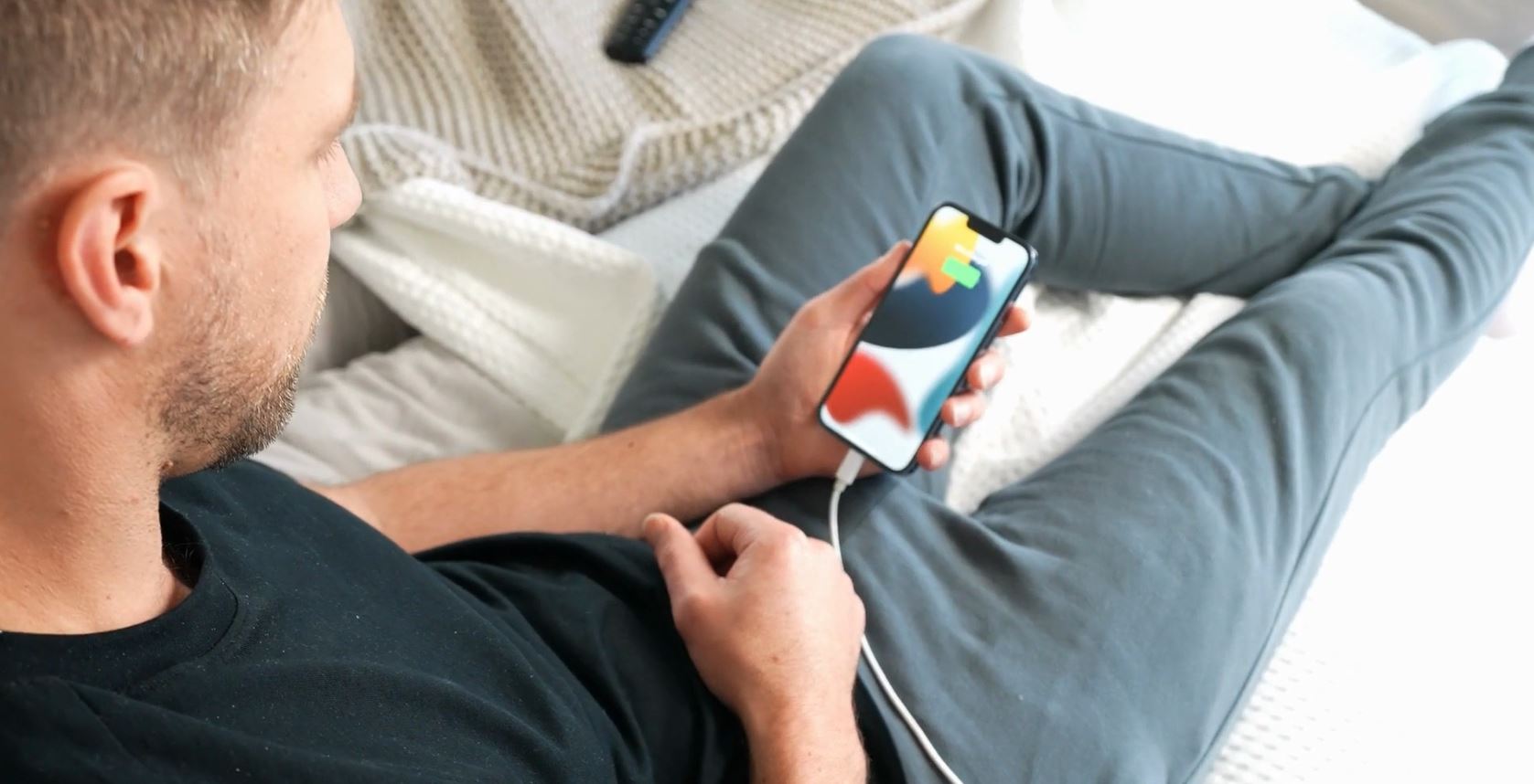 comfort and casual relaxation while using a device in bed